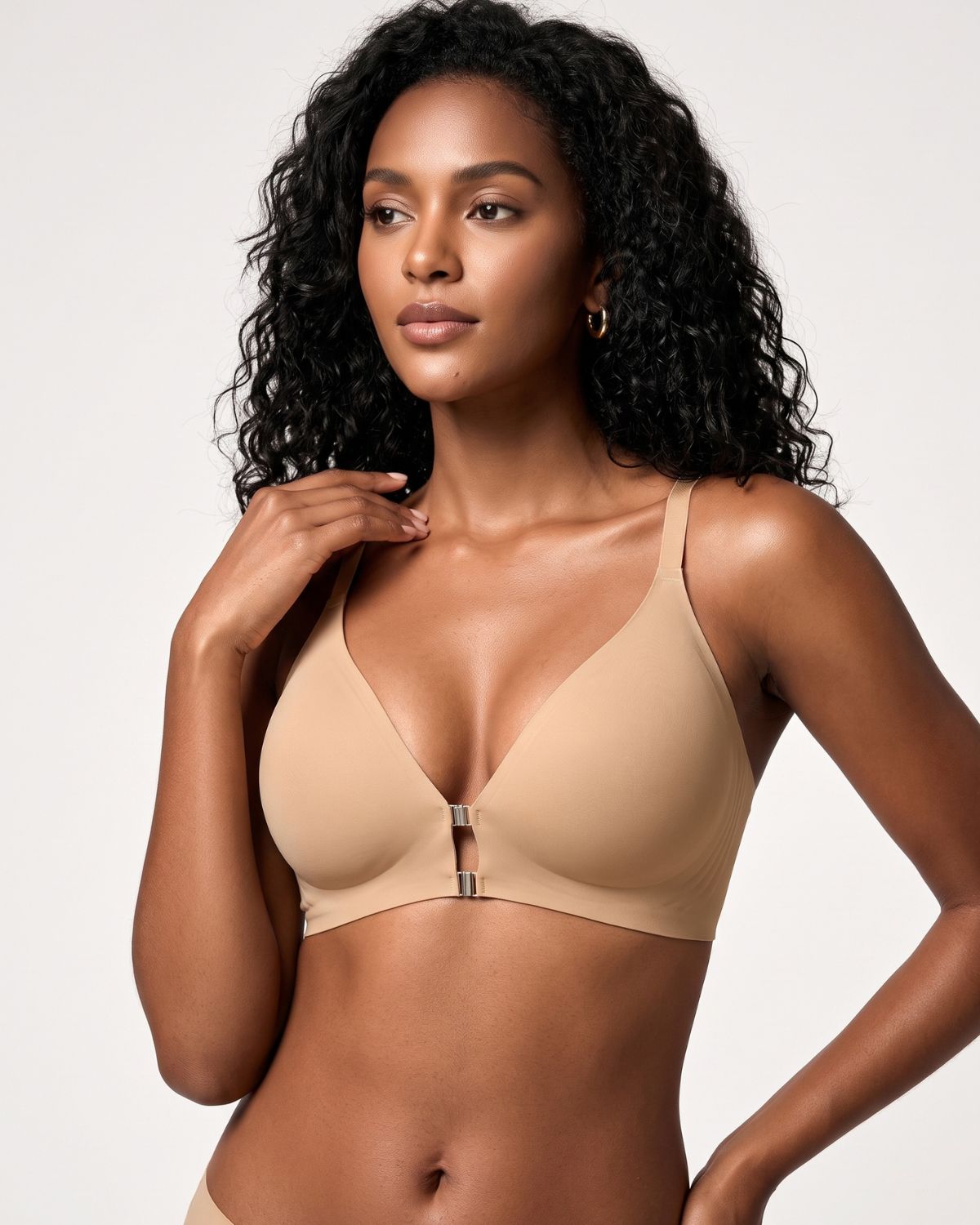 Reggiseno senza ferretto, senza cuciture, con chiusura anteriore e spalline incrociate sulla schiena