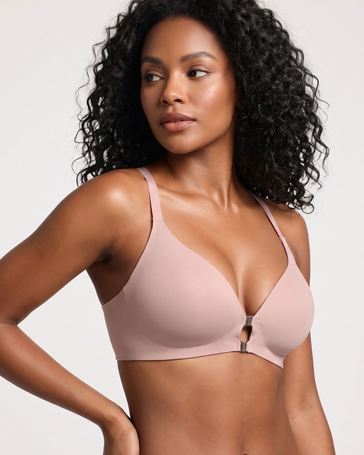 Reggiseno senza ferretto, senza cuciture, con chiusura anteriore e spalline incrociate sulla schiena