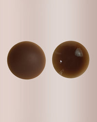 Invisible silicone nipple covers – reusable & hypoallergenic.